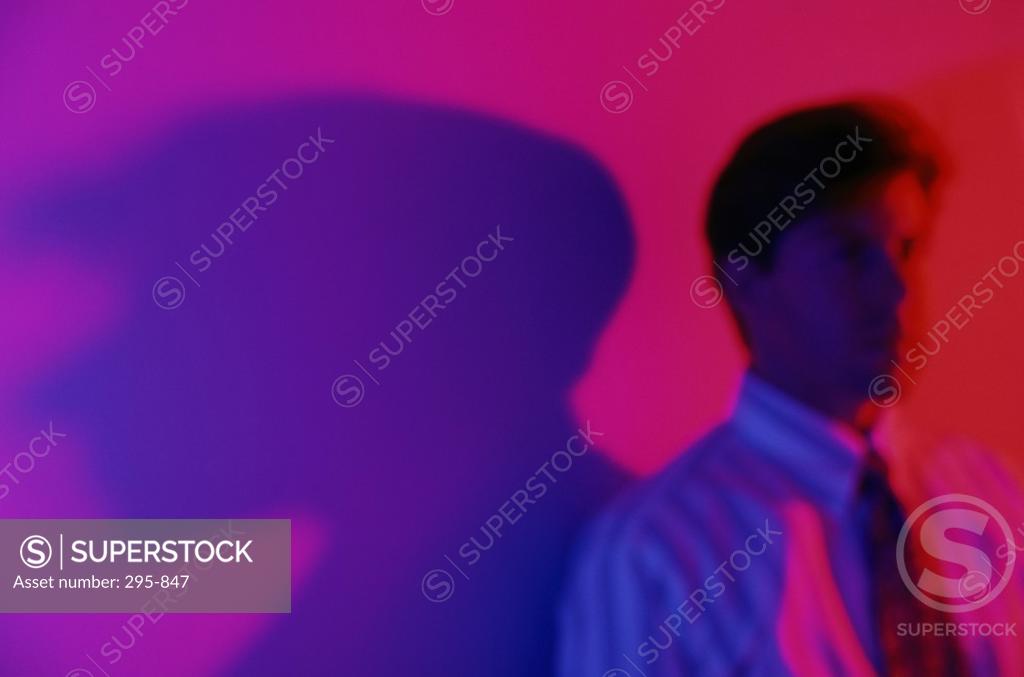 Stock Photo: 295-847 Young man looking serious