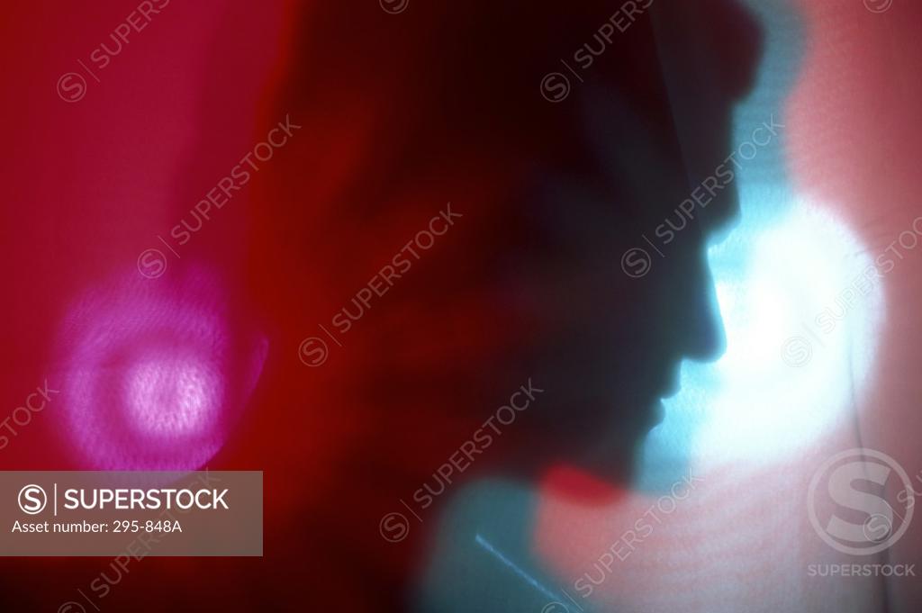 Stock Photo: 295-848A Silhouette of a young man