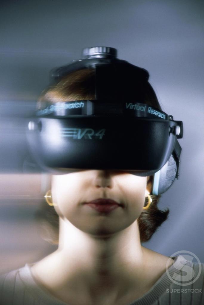 Young woman wearing a Virtual Reality Simulator