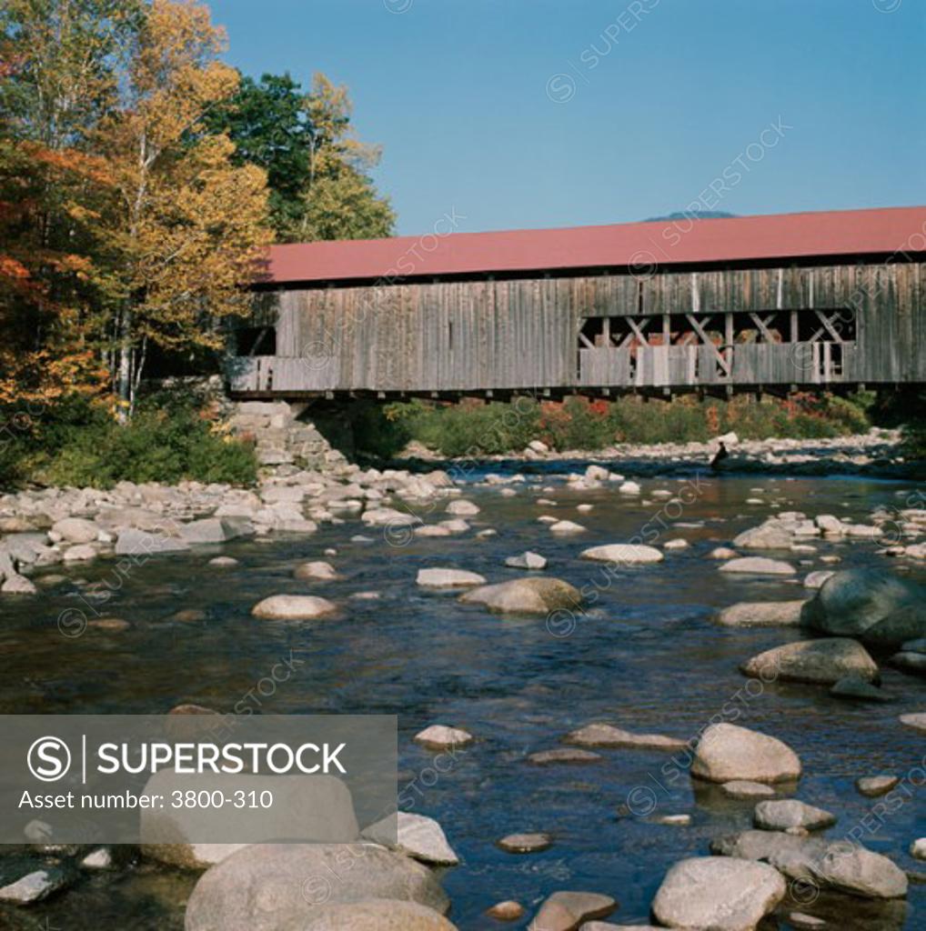 Stock Photo: 3800-310 Covered bridge over a river, Swift River, New Hampshire, USA
