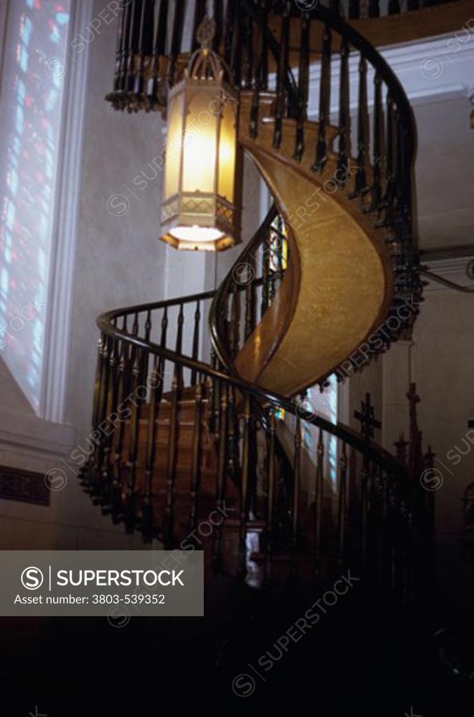 Stock Photo: 3803-539352 Low angle view of a spiral staircase