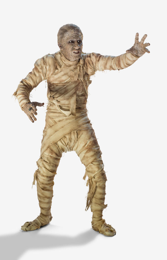 Full length portrait of a man dressed as a mummy wrapped in decaying bandages for Halloween making painful movements, against a white background