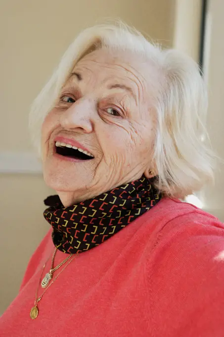 Elderly woman smiling for the camera