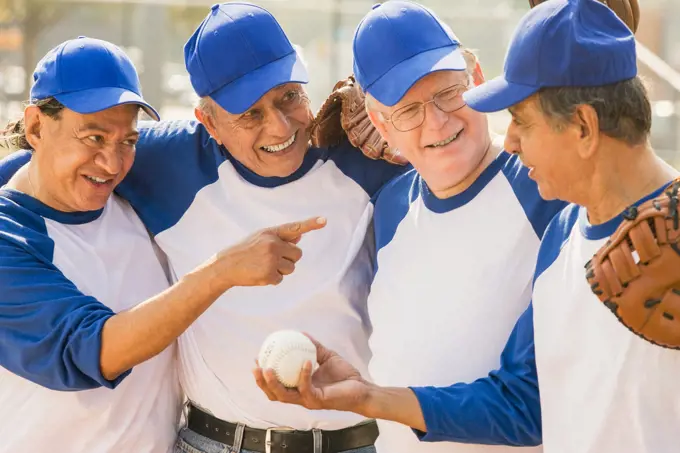 Senior men playing on baseball team