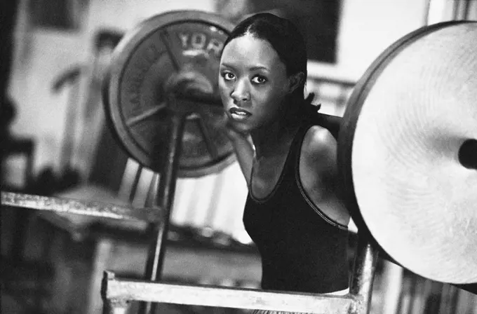 African woman weight lifting