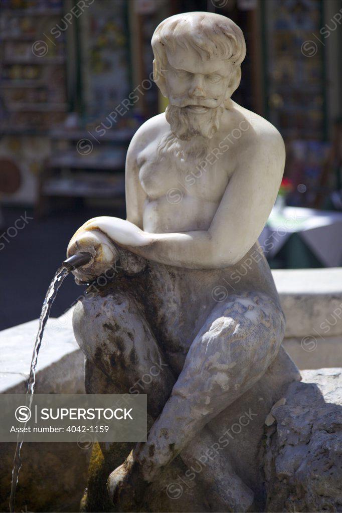 Stock Photo: 4042-1159 Italy, Amalfi, sculpture in fountain