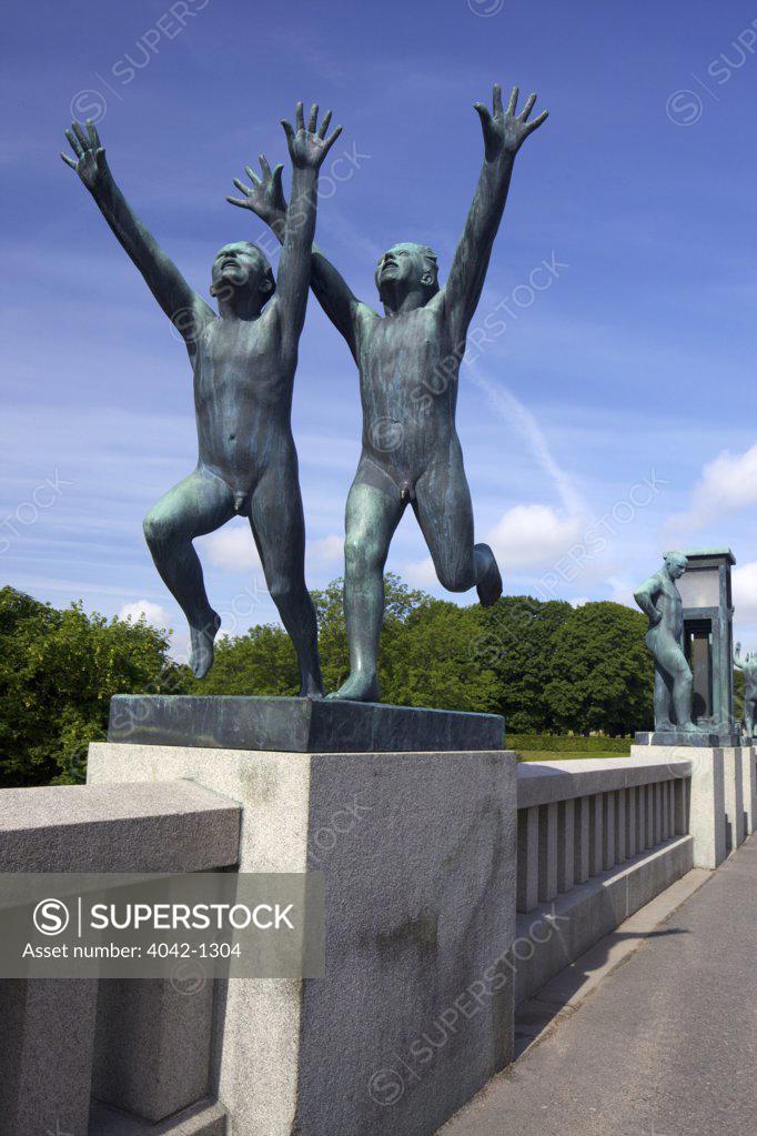 Stock Photo: 4042-1304 Norway, Oslo, Vigeland Sculpture Park, Boys running, sculpture by Gustav Vigeland
