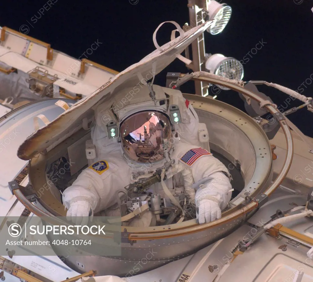 International Space Station in 2011. Astronaut Andrew Feustel reenters the space station after completing an 8-hour spacewalk on May 22, 2011.