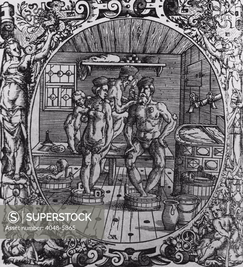 16th century scene of therapeutic bathing and cupping. A man and a woman in a sauna, soaking their feet in water, with a child and physician. Application on small glass cups on their skin increases local blood flow. 1565 woodcut from Paracelsus's, OPUS CHYRURGICUM.