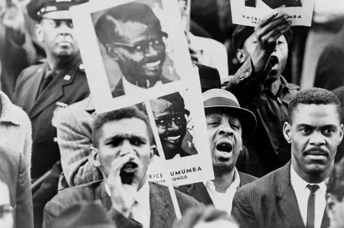 African American men at a Black Muslim demonstration carrying placards with portrait of Patrice Lumumba, Premier of Congo. Lumumba was executed on Jan. 17, 1961. Both the US and Belgian were acting to kill Lumumba, with the Belgians succeeding assisted by Congolese partners.