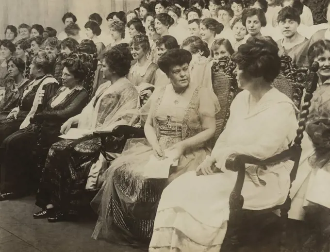 Alva Belmont, seated second from right, was the wealthy former wife of a Vanderbilt and Belmont, and the most important financial benefactor of the National Woman’s Party. Dripping in jewels, she attends the Women's Voter Convention, Sept. 1915.