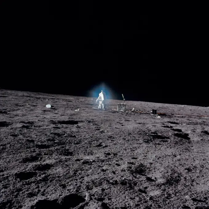 Apollo 12 Astronaut Alan Bean deploys scientific experiments on the lunar surface. Nov. 19, 1969.