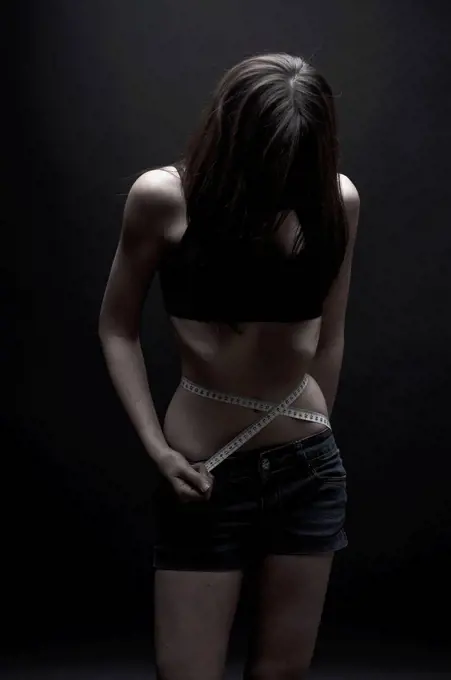 Anorexic teenage girl, conceptual image