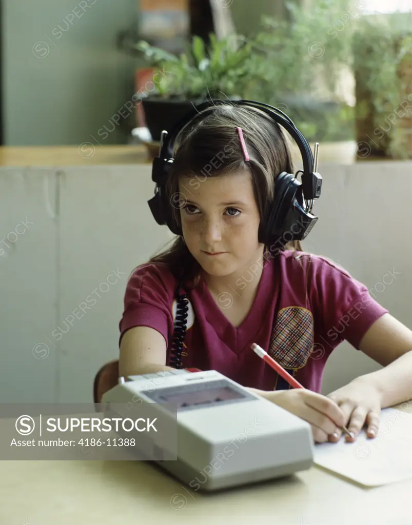 1980S Girl Listening To Tape Wearing Headphones