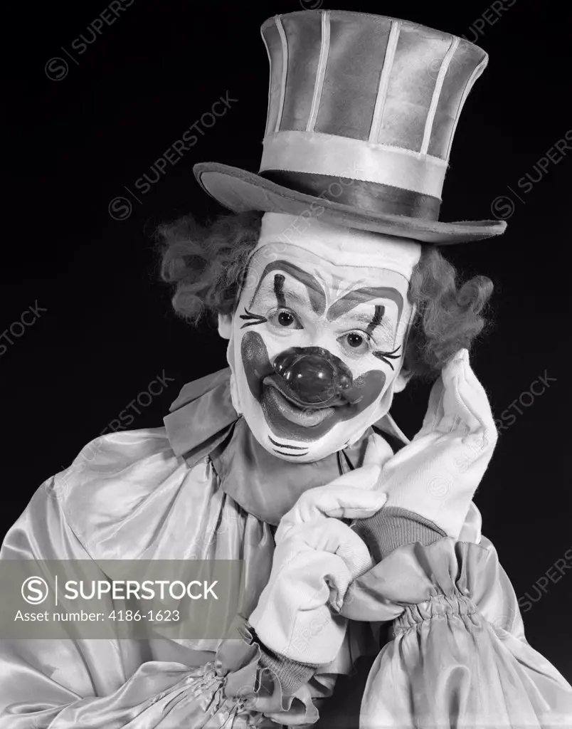 1950S Portrait Of Clown Wearing Top Hat Smiling Indoor