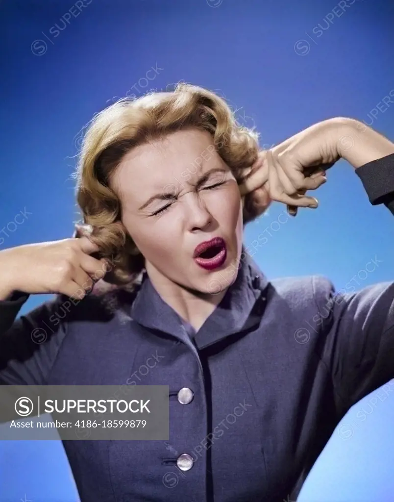 1950s ANNOYED WOMAN PORTRAIT FINGERS PLUGGING EARS