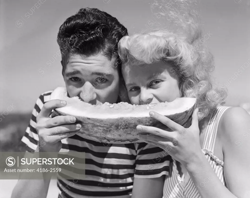 1940S 1950S Teen Age Boy & Girl Eating Slice Watermelon