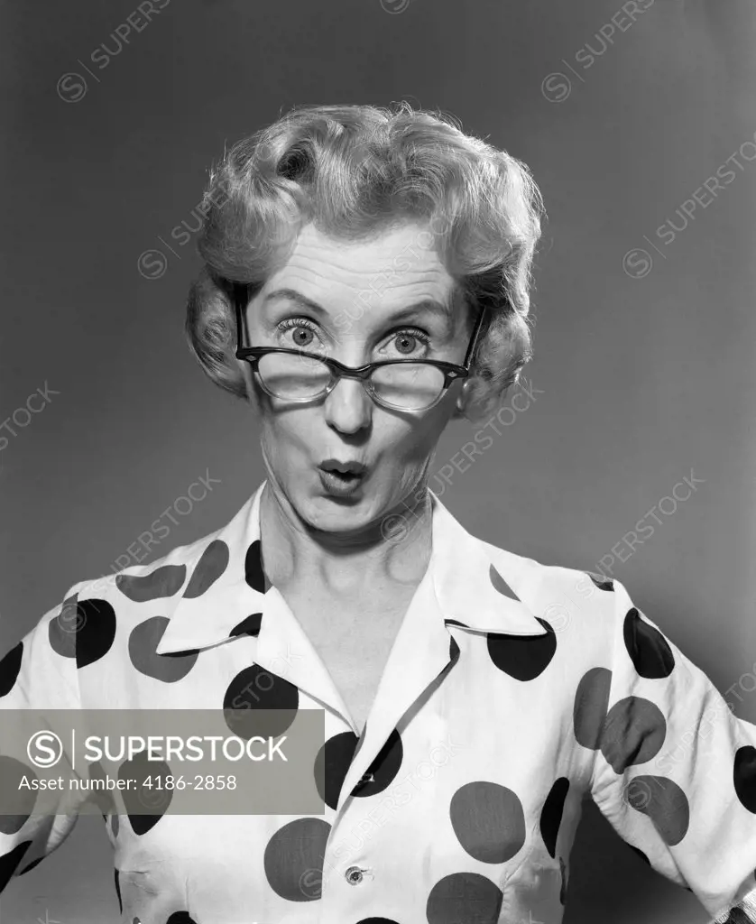 1950S 1960S Portrait Woman Polka Dot Dress Looking Over Eyeglasses