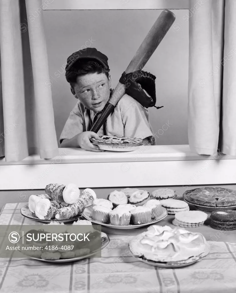 1950S Boy In Baseball Garb With Bat Sneaking Pie Through Open Window