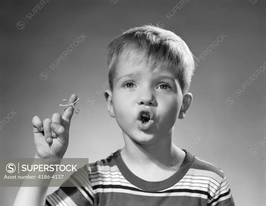 1950S Boy Funny Facial Expression Blond String Tied To Finger To Remember Not To Forget