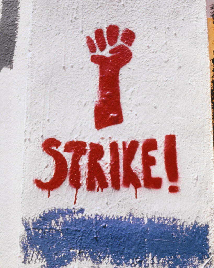 1970s RED FIST STRIKE PROTEST SIGN STENCILED GRAFFITI PAINTED ON WALL