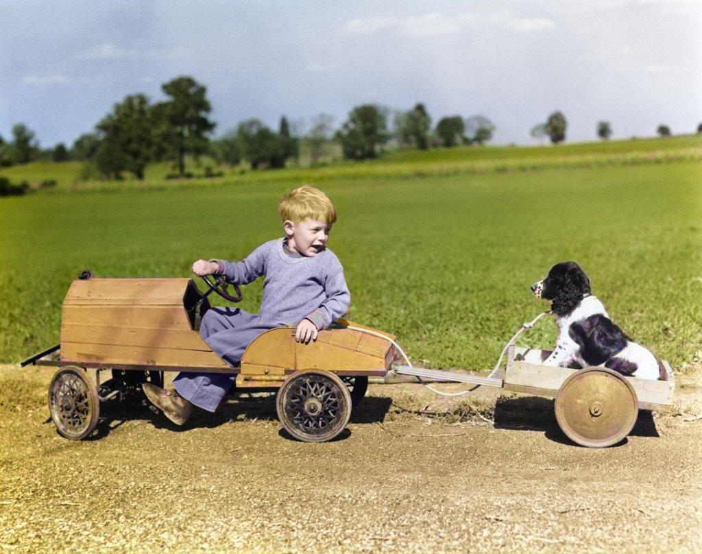1930s 1940s BOY IN WOODEN TOY CAR PULLING DOG BEHIND IN WAGON