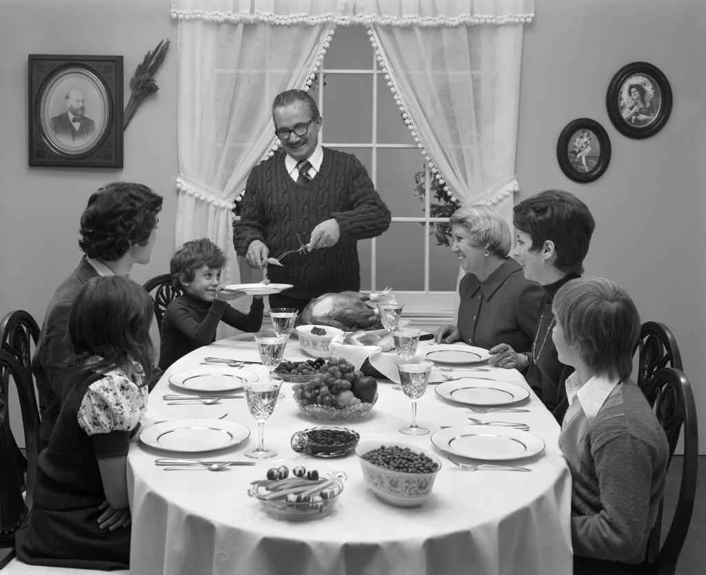 1970S Three Generation Family Sitting At Thanksgiving Turkey Dinner Turkey Table