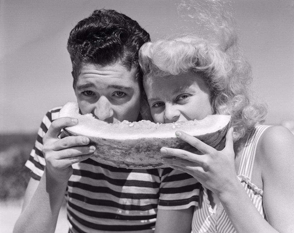 1940S 1950S Teen Age Boy & Girl Eating Slice Watermelon