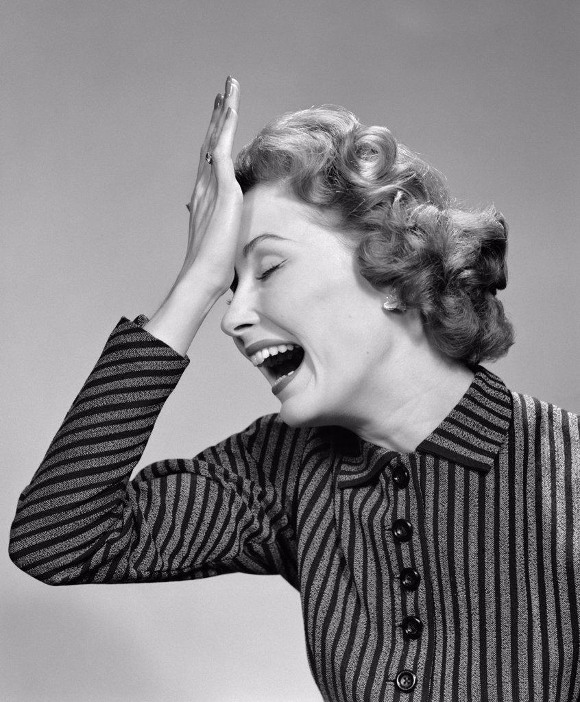 1950S Woman Hitting Forehead With Heel Of Hand As If She'S Made A Mistake Or Forgotten Something Studio