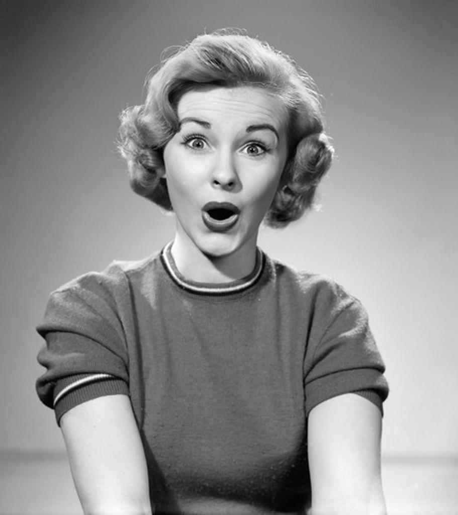 1950S Head Shot Of Woman Eyes And Mouth Wide Open Surprised Expression Indoor