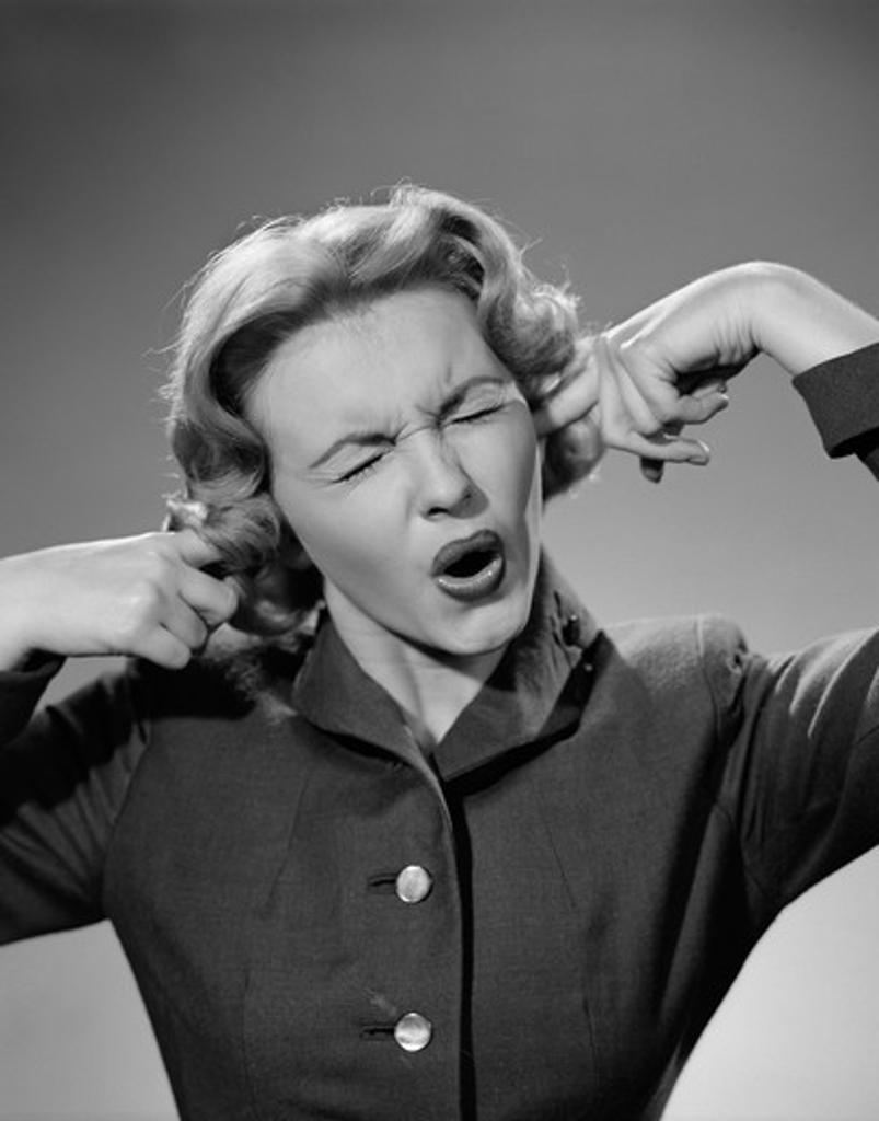 1950S Woman Portrait Fingers Plugging Ears