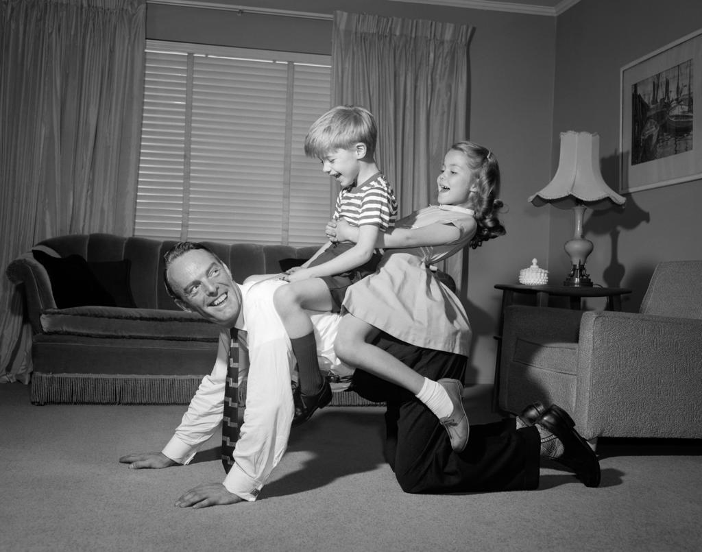 1950S Dad Carrying Boy & Girl Piggyback