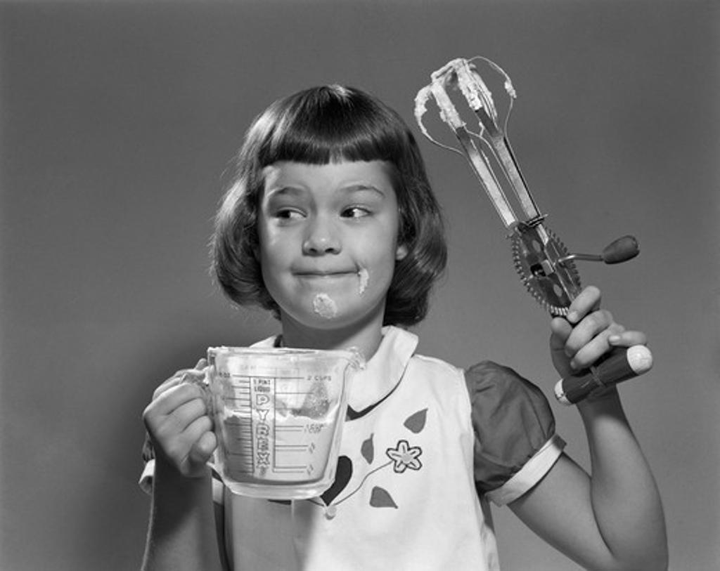 1950S Smiling Girl Holding Measuring Cup Egg Beaters Cooking Mixing Food On Face