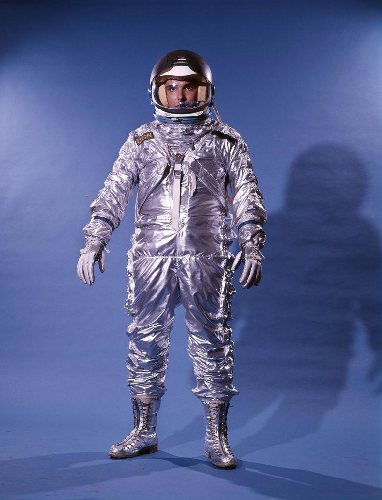 1960S Man In Silver Astronaut Space Suit And Helmet