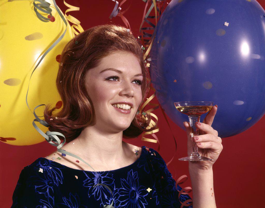 1960S Young Woman Smiling Toasting Toast Glass Champagne Balloons Streamers Background Party New Years