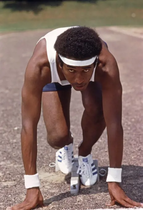 1970S African-American Athlete Runner At Starting Block