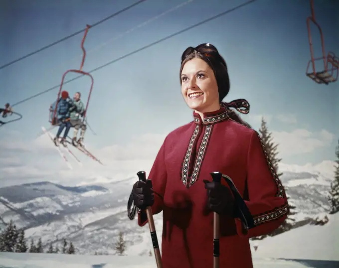 1950S 1960S Smiling Young Woman Red Poncho Ski Lift Background