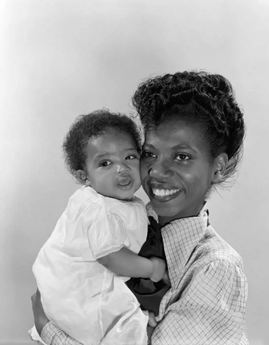 1950S African American Mother Holding Baby