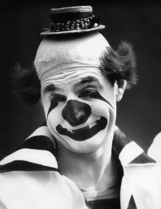 1930S Clown In Classic Whiteface With A Happy Sad Face With A Bald Head Wearing A Tiny Straw Hat