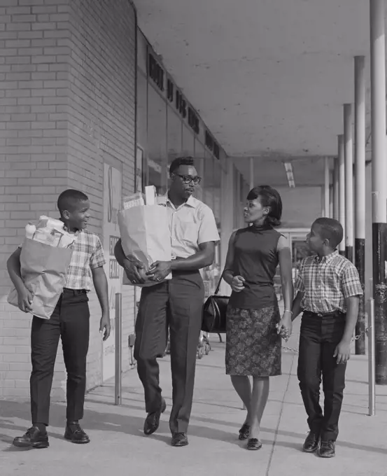 1960S African American Family Carrying Grocery Bags