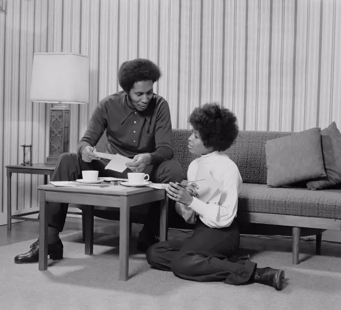 1970S African American Couple Living Room Talking Over Coffee 