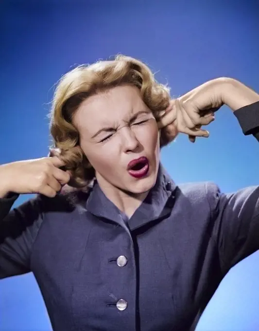 1950s ANNOYED WOMAN PORTRAIT FINGERS PLUGGING EARS