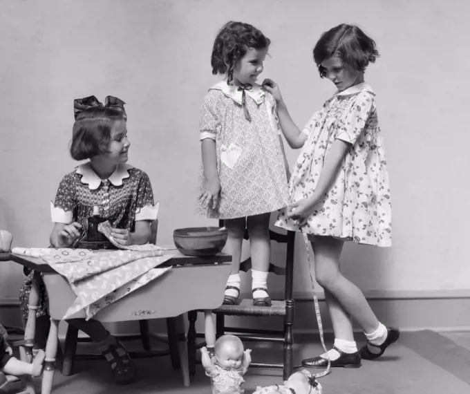 1930S Three Girls Playing Fashion Seamstress Pretending Measuring Fabric
