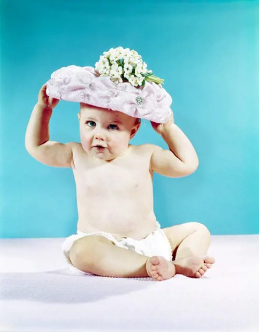 1960S Baby Girl Wearing Flowered Spring Easter Bonnet Hat