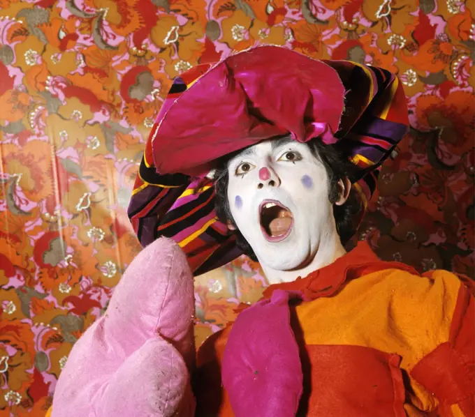 1970S Man Circus Clown Wearing Colorful Floppy Hat Pink Orange Costume Open Mouth Surprised Expression