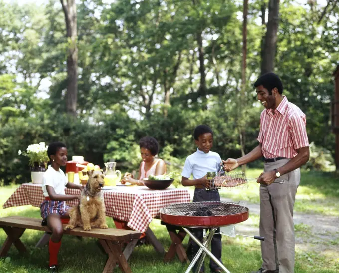 1970S African American Family Backyard Picnic Barbecue 
