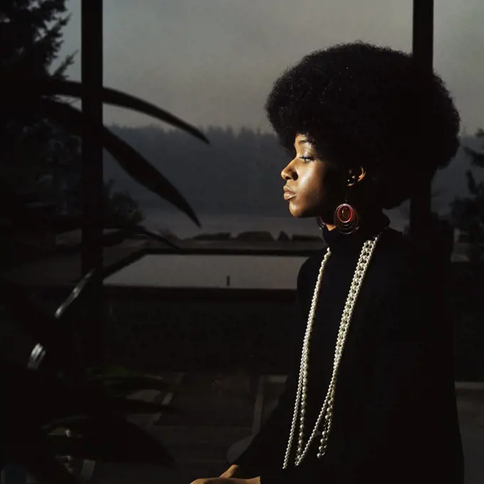 1960S 1970S Serious Moody Profile Portrait African American Woman With Afro Hair Style Earrings Pearl Bead Necklace Fashion