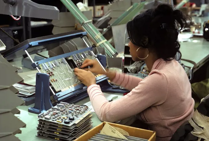 1970S Woman Assembling Computer
