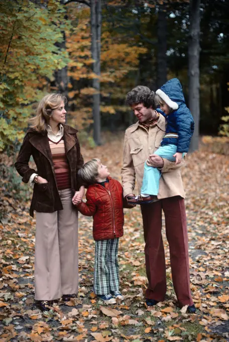 1980S Family Mother Father Children Walking In Autumn Woods