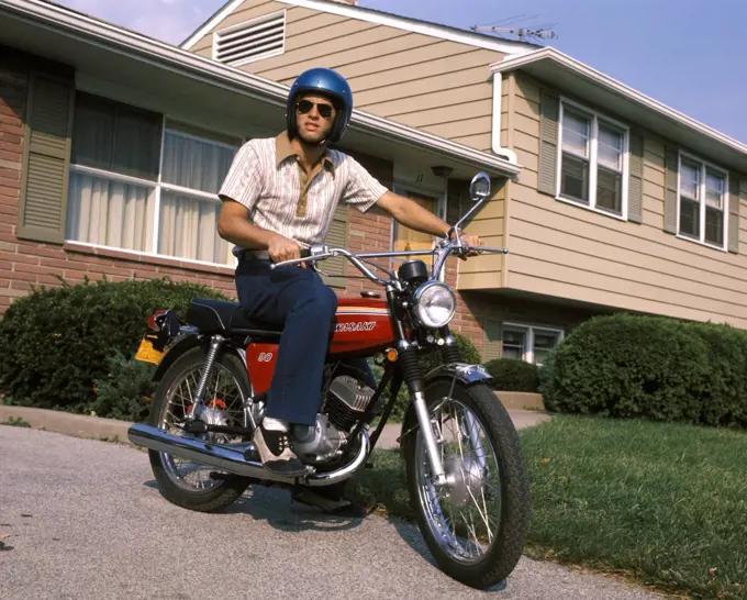 1970S Young Man Blue Helmet Sitting On Motorcycle In Driveway Suburban House Bike Motorcycles Men